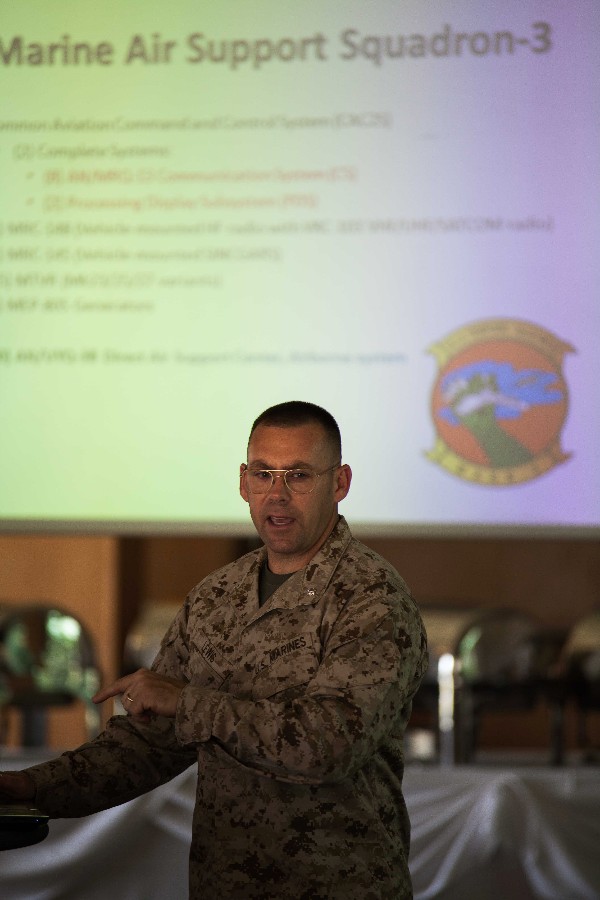 Guest speaker Lt. Col. John Lewis, USMC, speaks on the Marine Air Command and Control Systems in May.